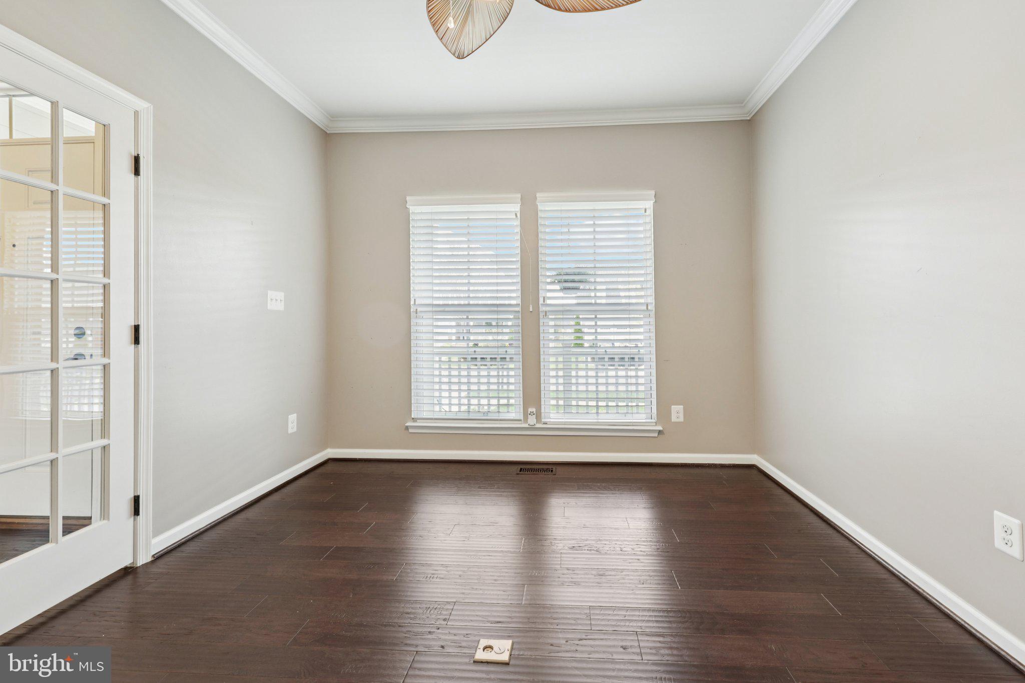 17518 Spring Cress Drive Dumfries, VA 22026 - Photo 46 of 89 an empty room with wooden floor and windows
