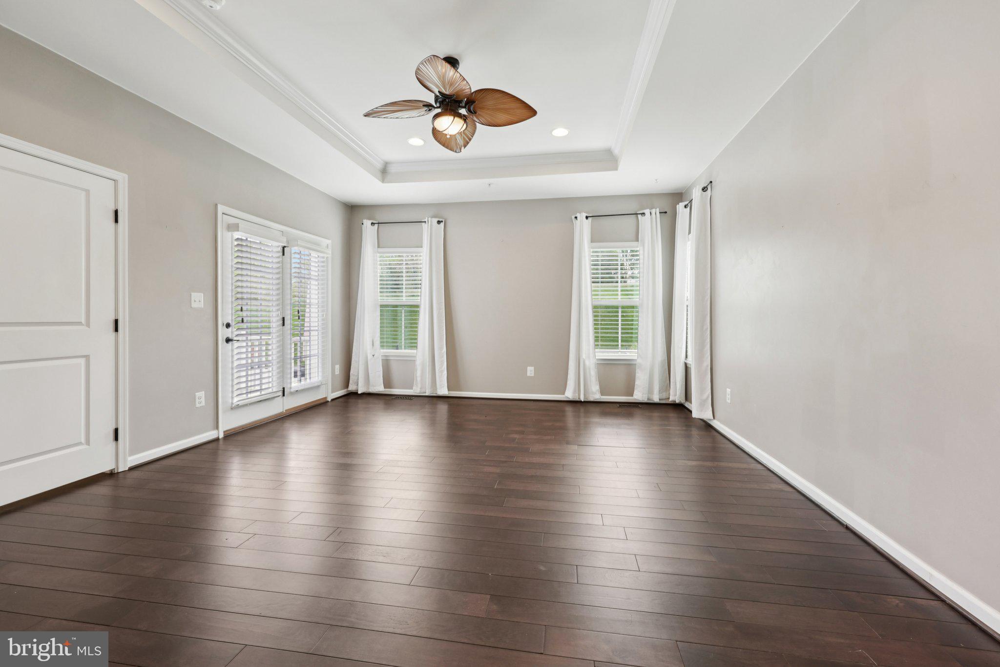 17518 Spring Cress Drive Dumfries, VA 22026 - Photo 52 of 89 wooden floor in an empty room with a window