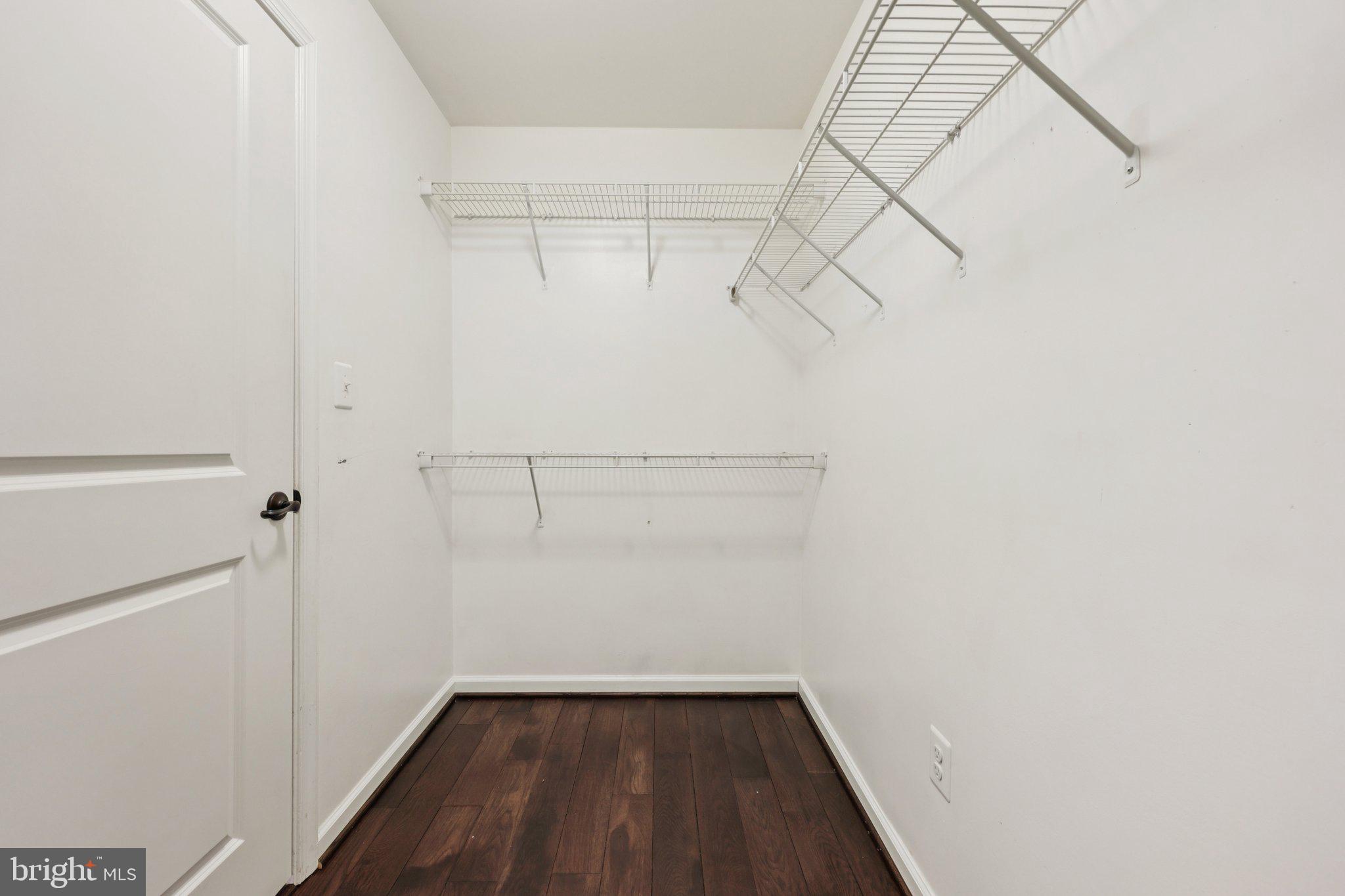 17518 Spring Cress Drive Dumfries, VA 22026 - Photo 55 of 89 a view of a room with racks on the wall