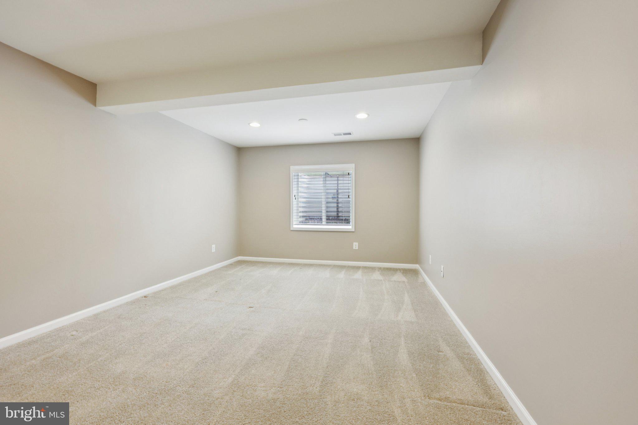 17518 Spring Cress Drive Dumfries, VA 22026 - Photo 79 of 89 an empty room with a window