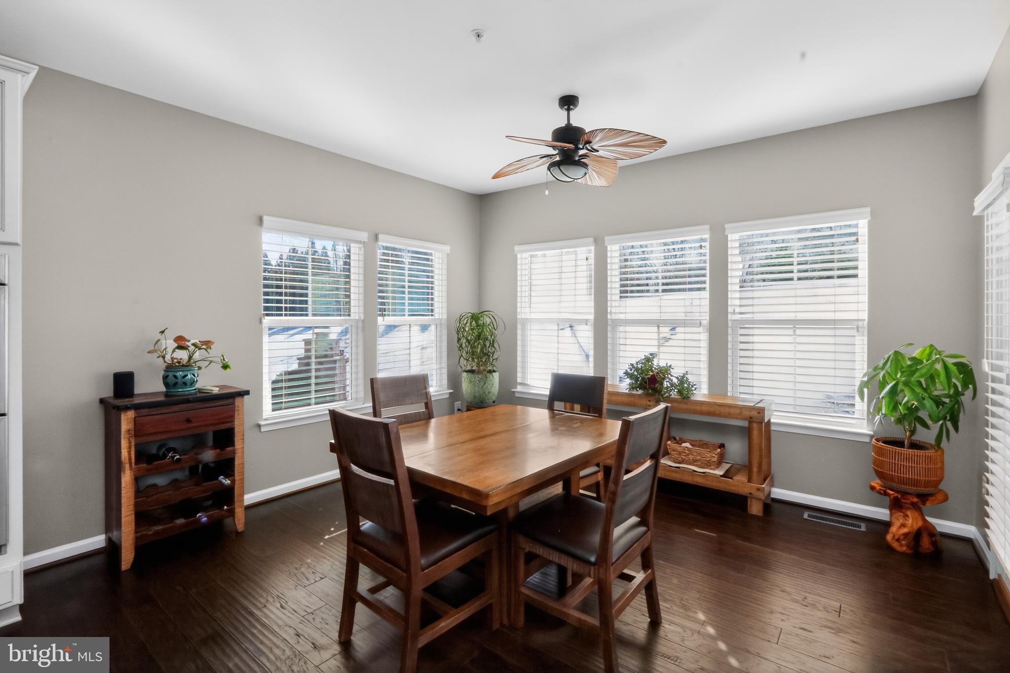 17518 Spring Cress Drive Dumfries, VA 22026 - Photo 8 of 37 a view of a dining room with furniture window and wooden floor