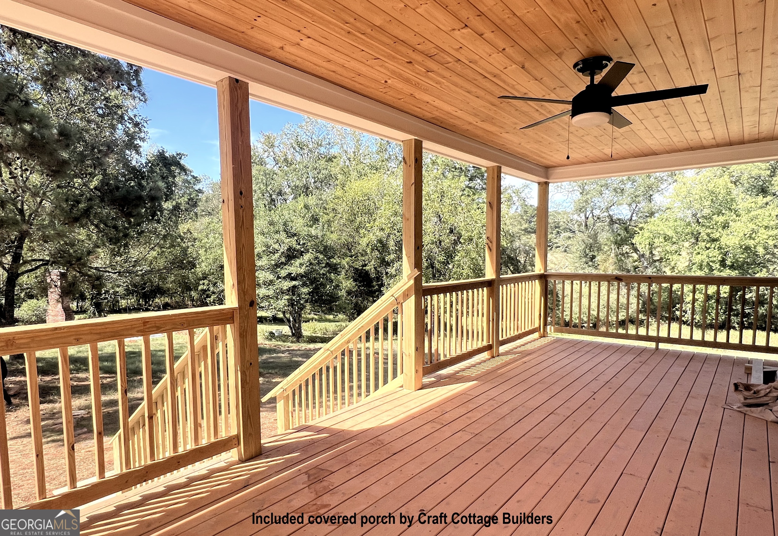195 Cedar Road Covington, GA 30016 - Photo 4 of 19 a view of a balcony with wooden floor