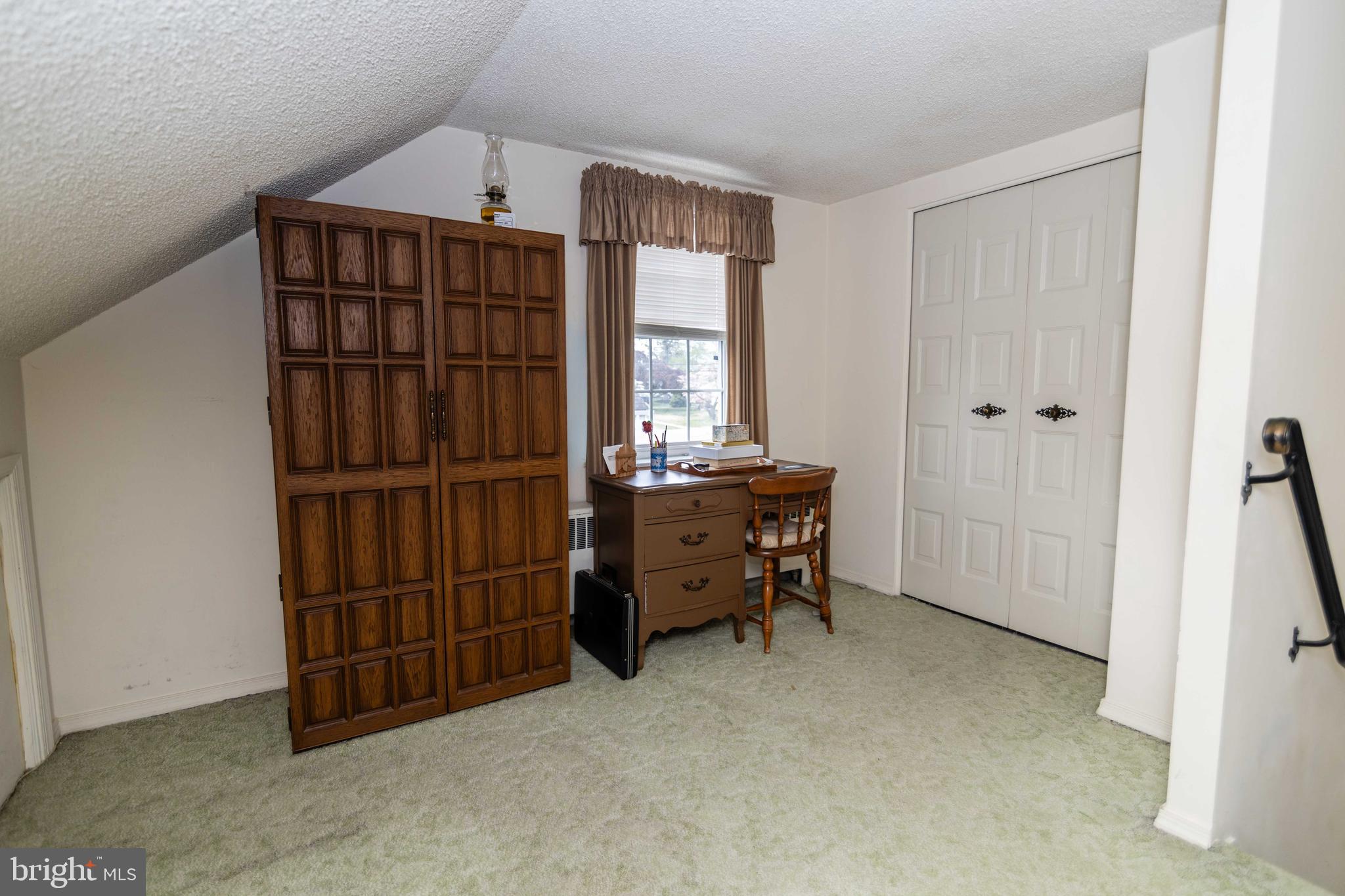 704 Hood Road Swarthmore, PA 19081 - Photo 18 of 34 a view of a livingroom with furniture and staircase