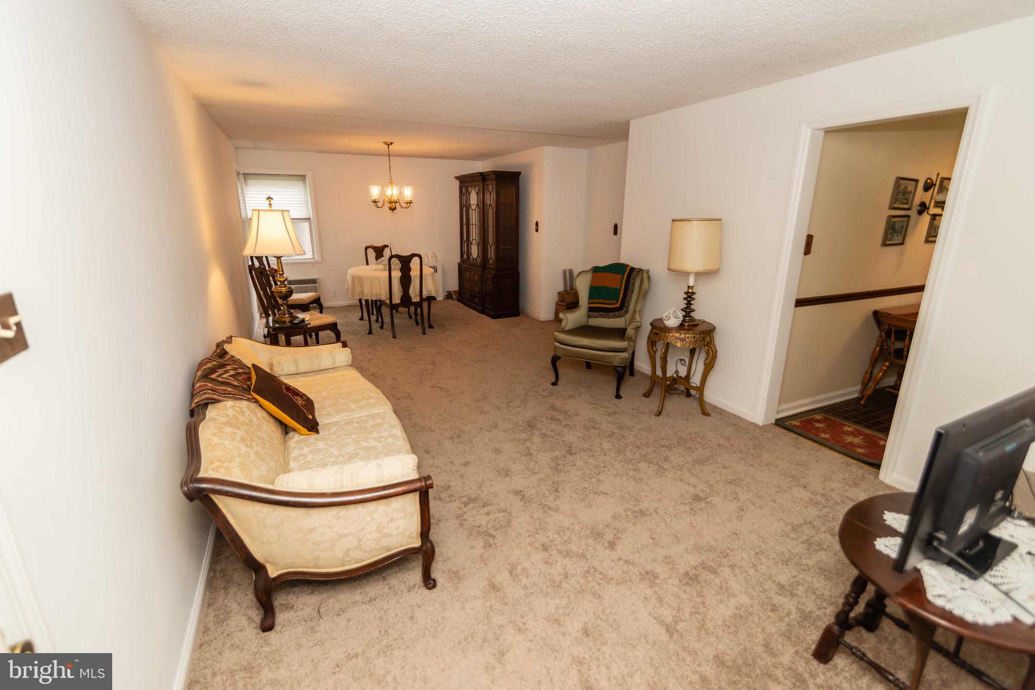 704 Hood Road Swarthmore, PA 19081 - Photo 3 of 34 a living room with furniture and a table