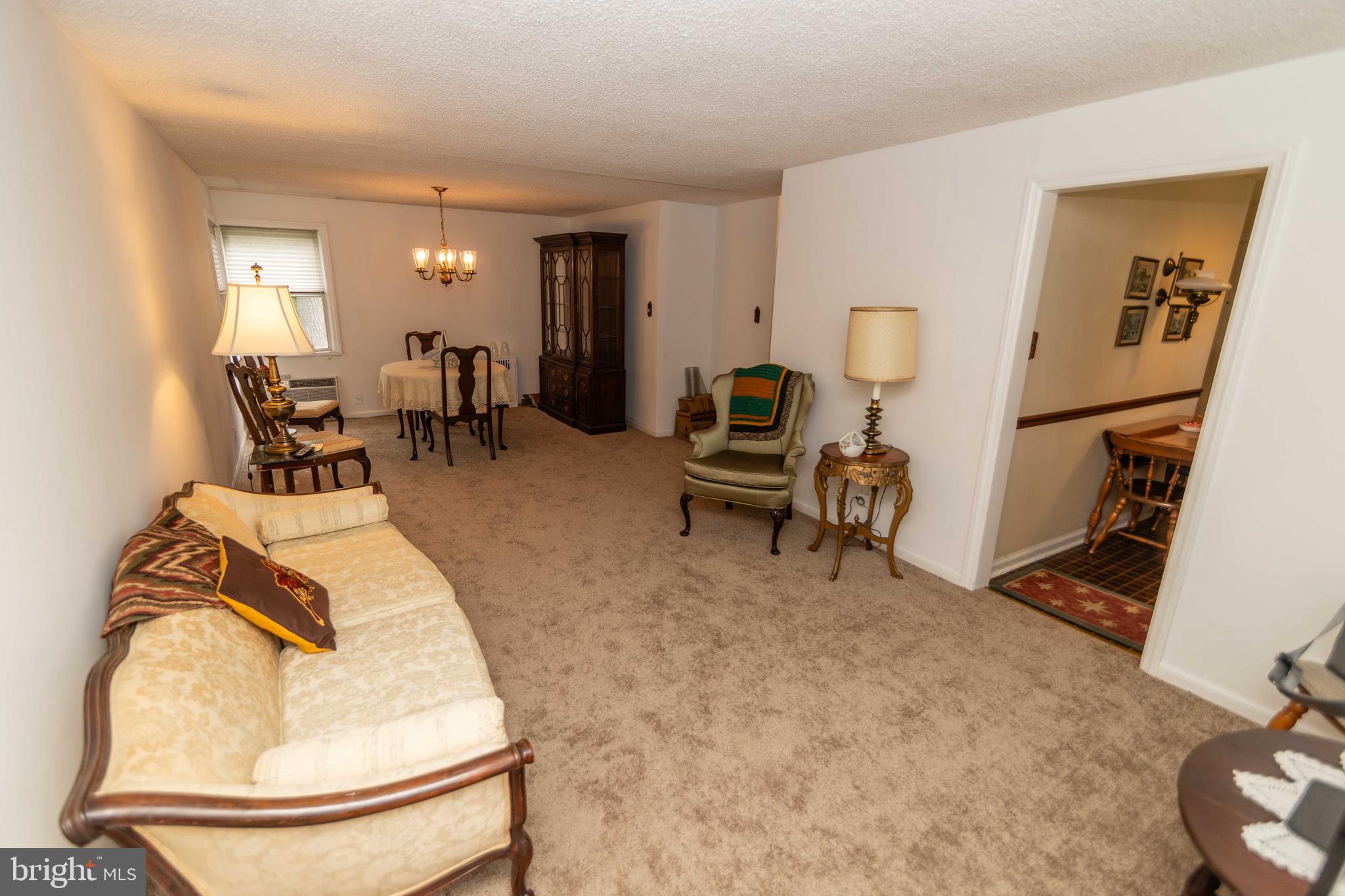 704 Hood Road Swarthmore, PA 19081 - Photo 4 of 34 a living room with furniture and a wooden floor