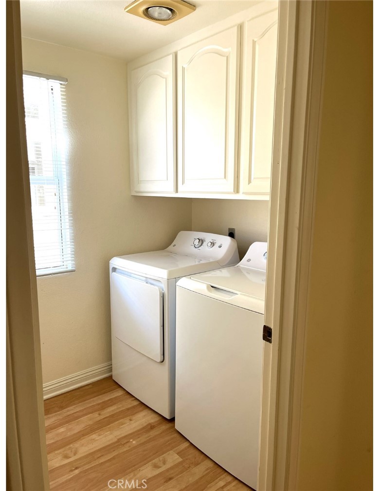 23 San Raphael Dana Point, CA 92629 - Photo 13 of 24 a utility room with dryer and washer
