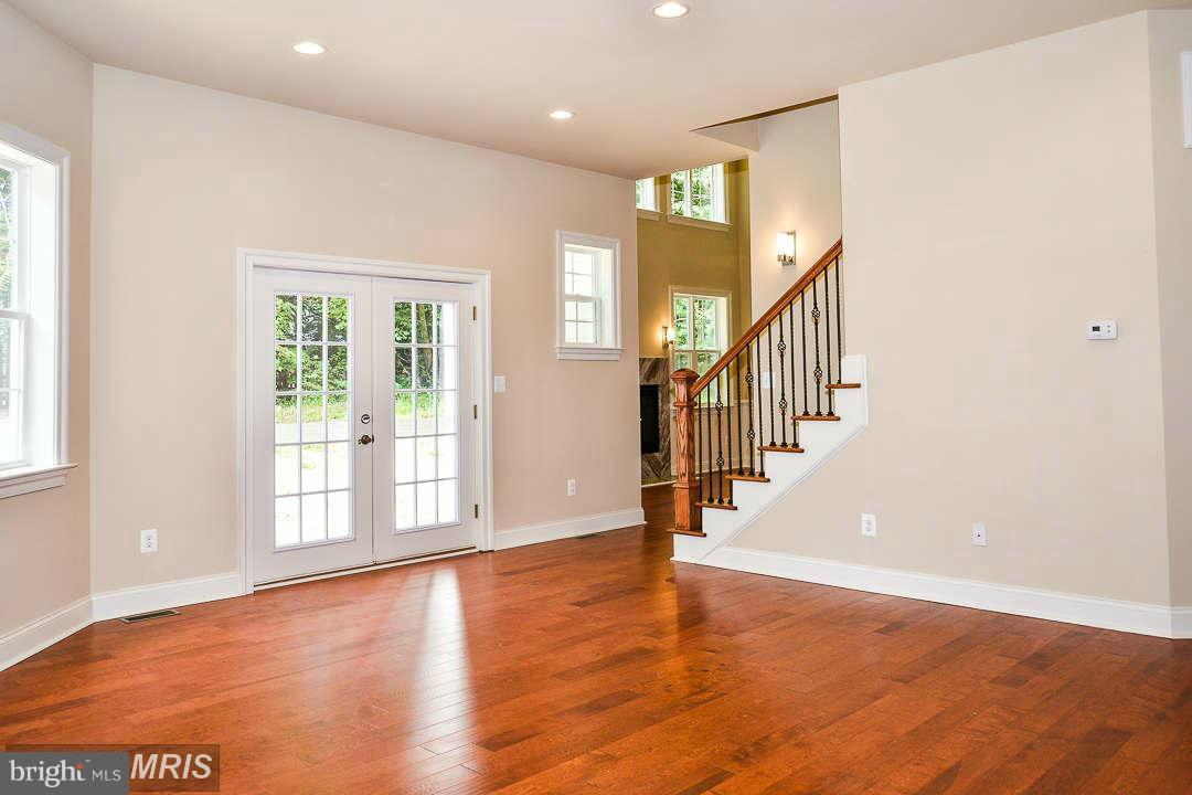 8536 Old Keene Mill Road Springfield, VA 22152 - Photo 9 of 30 a view of an entryway with wooden floor