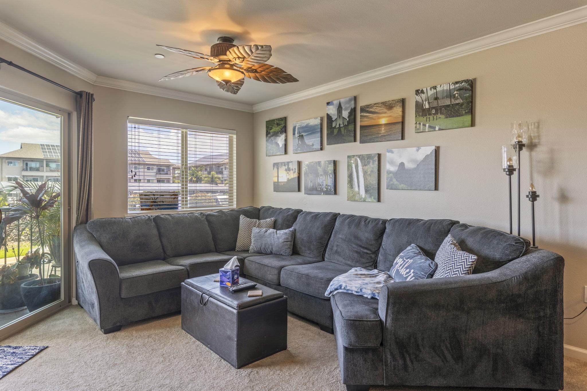 44 Kanani Road, Unit 2202 Kihei, HI 96753 - Photo 12 of 42 a living room with furniture and a large window