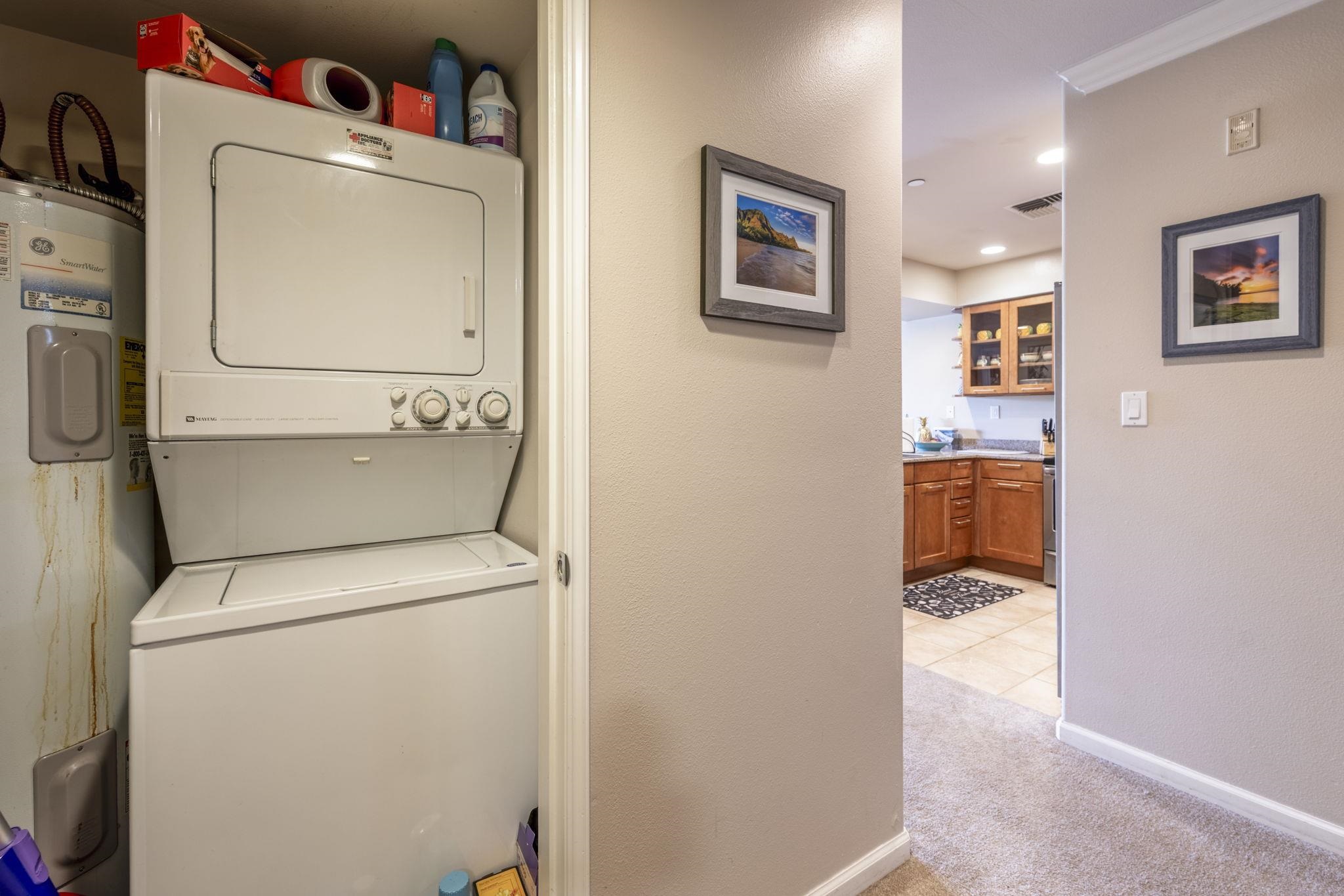 44 Kanani Road, Unit 2202 Kihei, HI 96753 - Photo 23 of 42 a utility room with dryer and washer