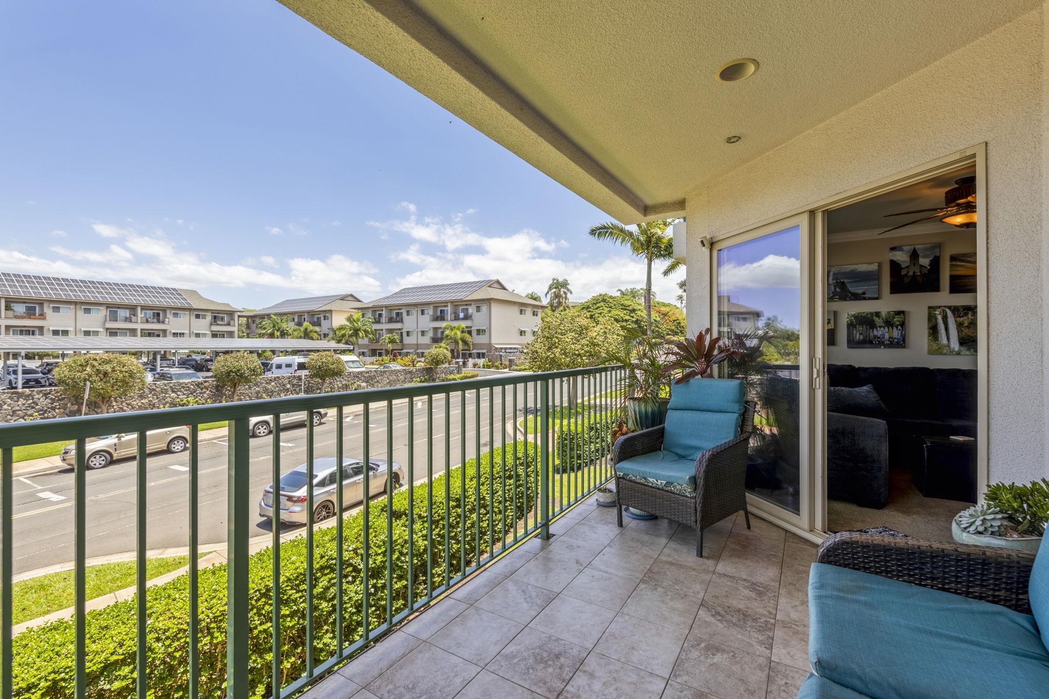 44 Kanani Road, Unit 2202 Kihei, HI 96753 - Photo 27 of 42 a view of a porch with furniture and a yard