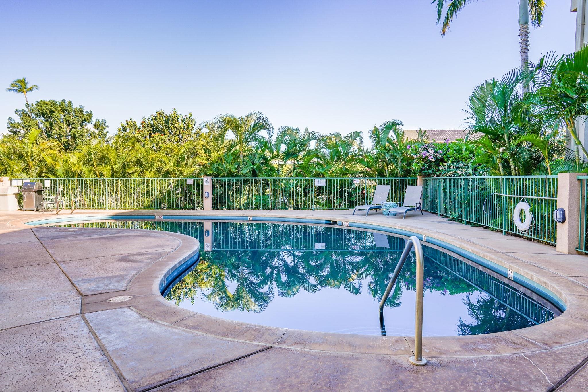 44 Kanani Road, Unit 2202 Kihei, HI 96753 - Photo 31 of 42 a view of a swimming pool with a patio