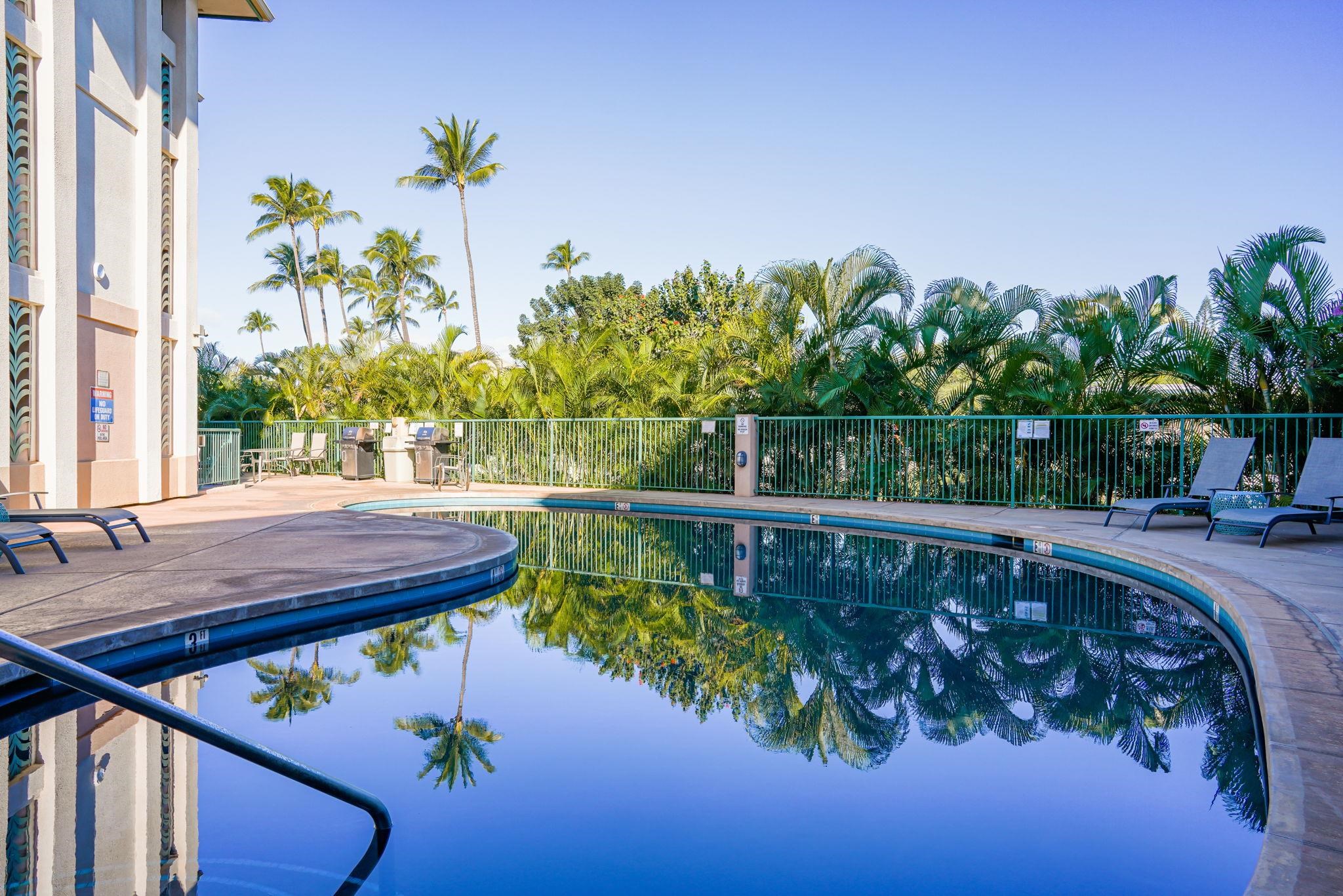 44 Kanani Road, Unit 2202 Kihei, HI 96753 - Photo 33 of 42 a view of a swimming pool with a patio