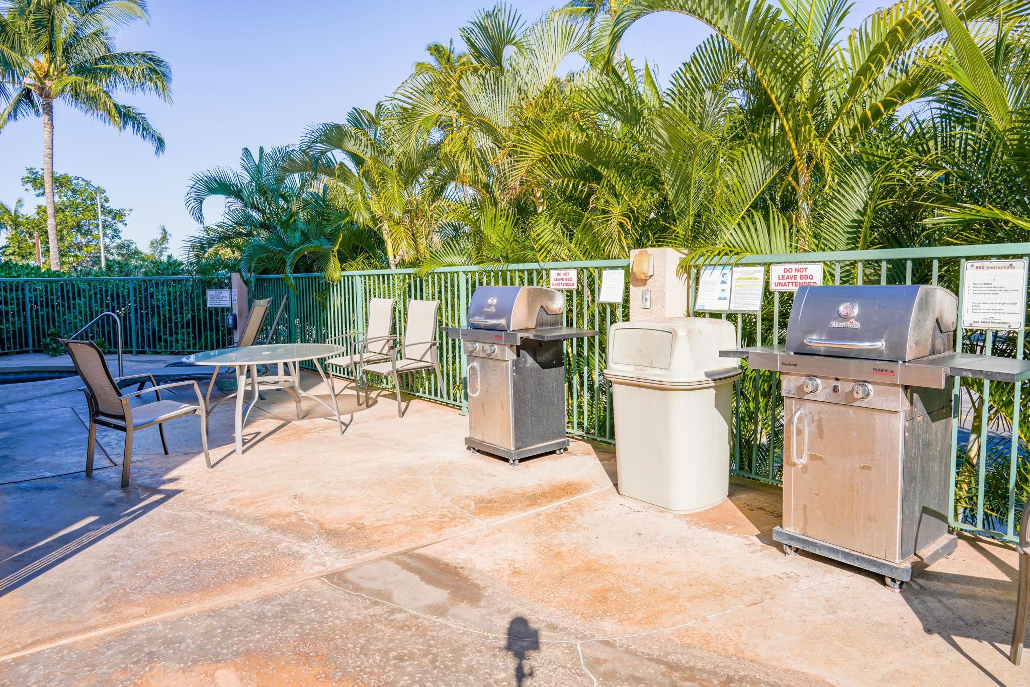 44 Kanani Road, Unit 2202 Kihei, HI 96753 - Photo 37 of 42 a view of a patio with chairs and potted plants