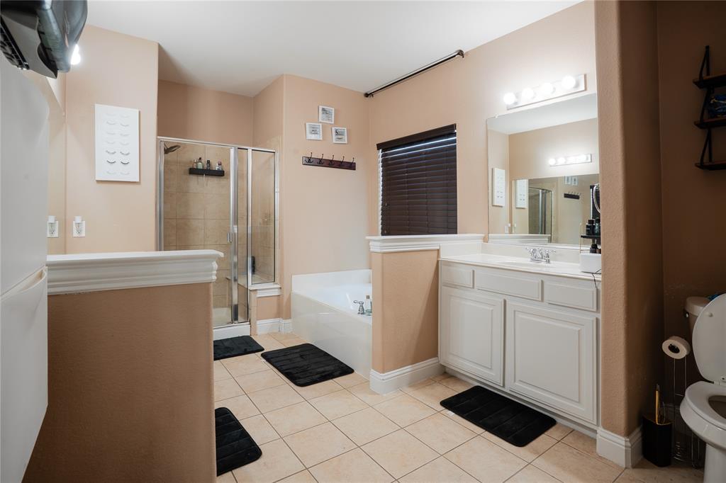 1444 Mercury Lane Lancaster, TX 75134 - Photo 11 of 19 a room with a washing machine and dryer