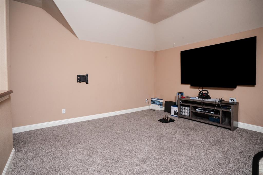 1444 Mercury Lane Lancaster, TX 75134 - Photo 16 of 19 a view of room with livingroom and flat screen tv