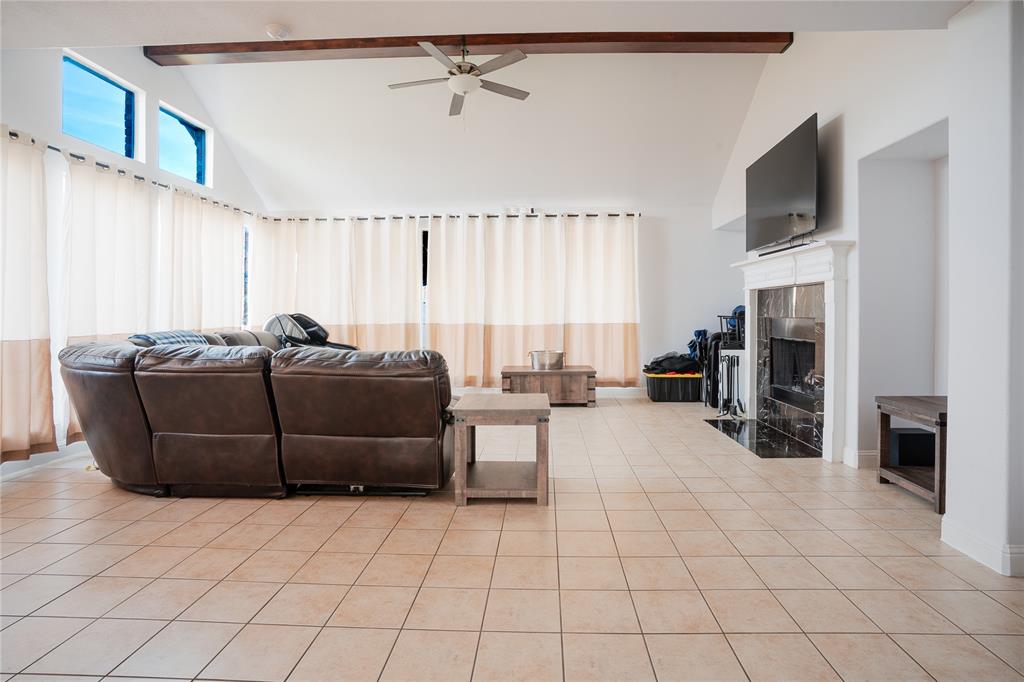 1444 Mercury Lane Lancaster, TX 75134 - Photo 9 of 19 a living room with furniture and a flat screen tv
