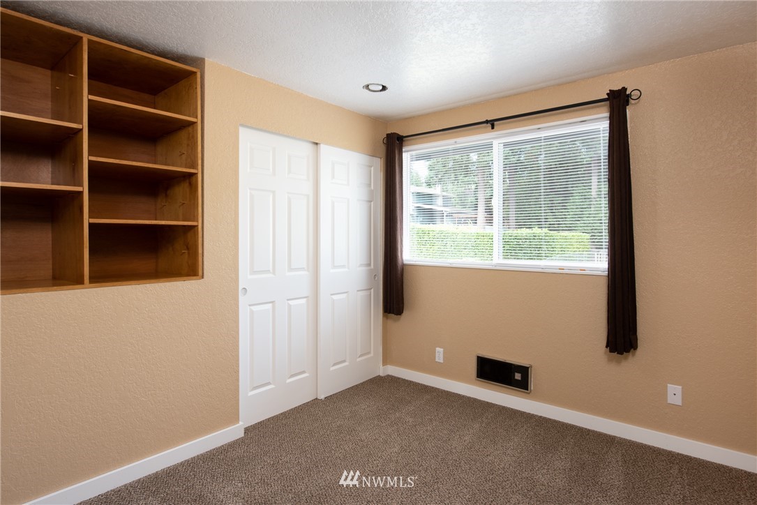 220 154th Place Southeast Bothell, WA 98012 - Photo 17 of 25 a view of an empty room with a window