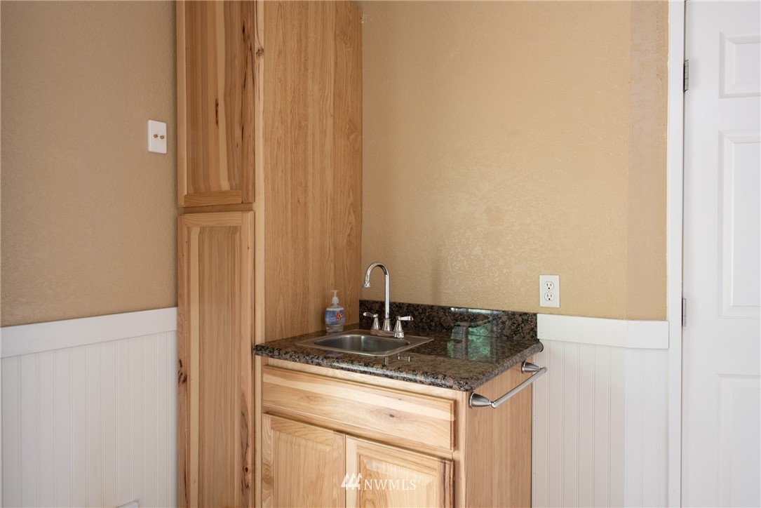 220 154th Place Southeast Bothell, WA 98012 - Photo 20 of 25 a kitchen with a sink and cabinets