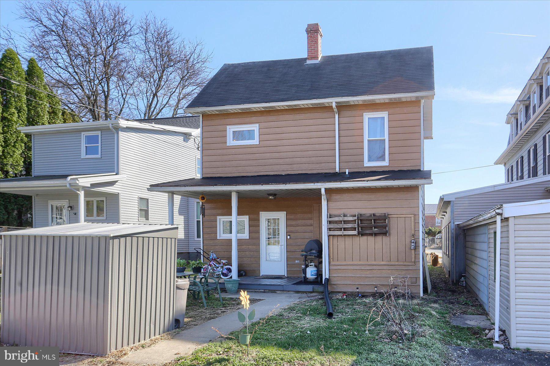 206 Armstrong Street Halifax, PA 17032 - Photo 20 of 20 a front view of a house with garden