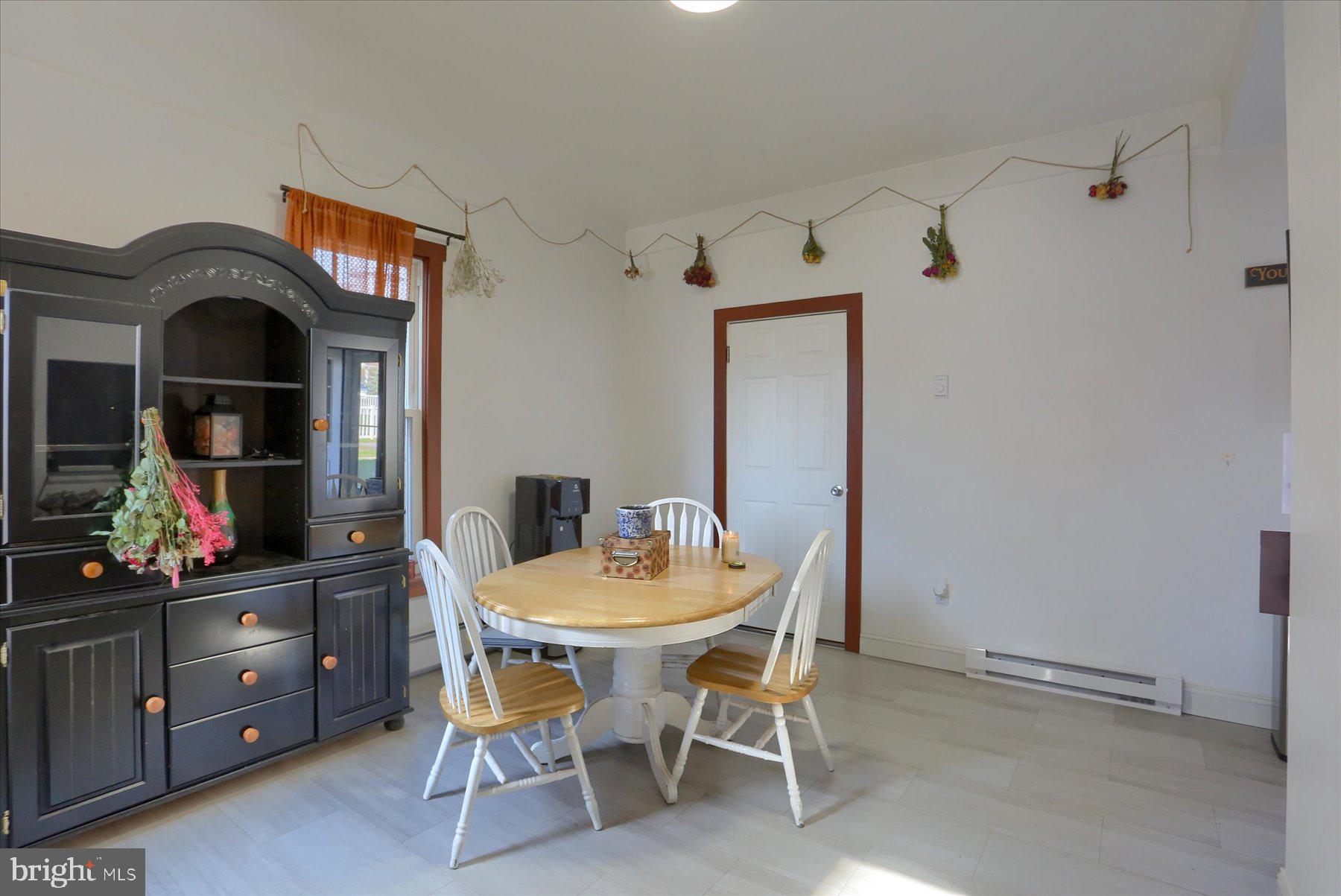 206 Armstrong Street Halifax, PA 17032 - Photo 8 of 20 a view of a dining room with furniture and chandelier