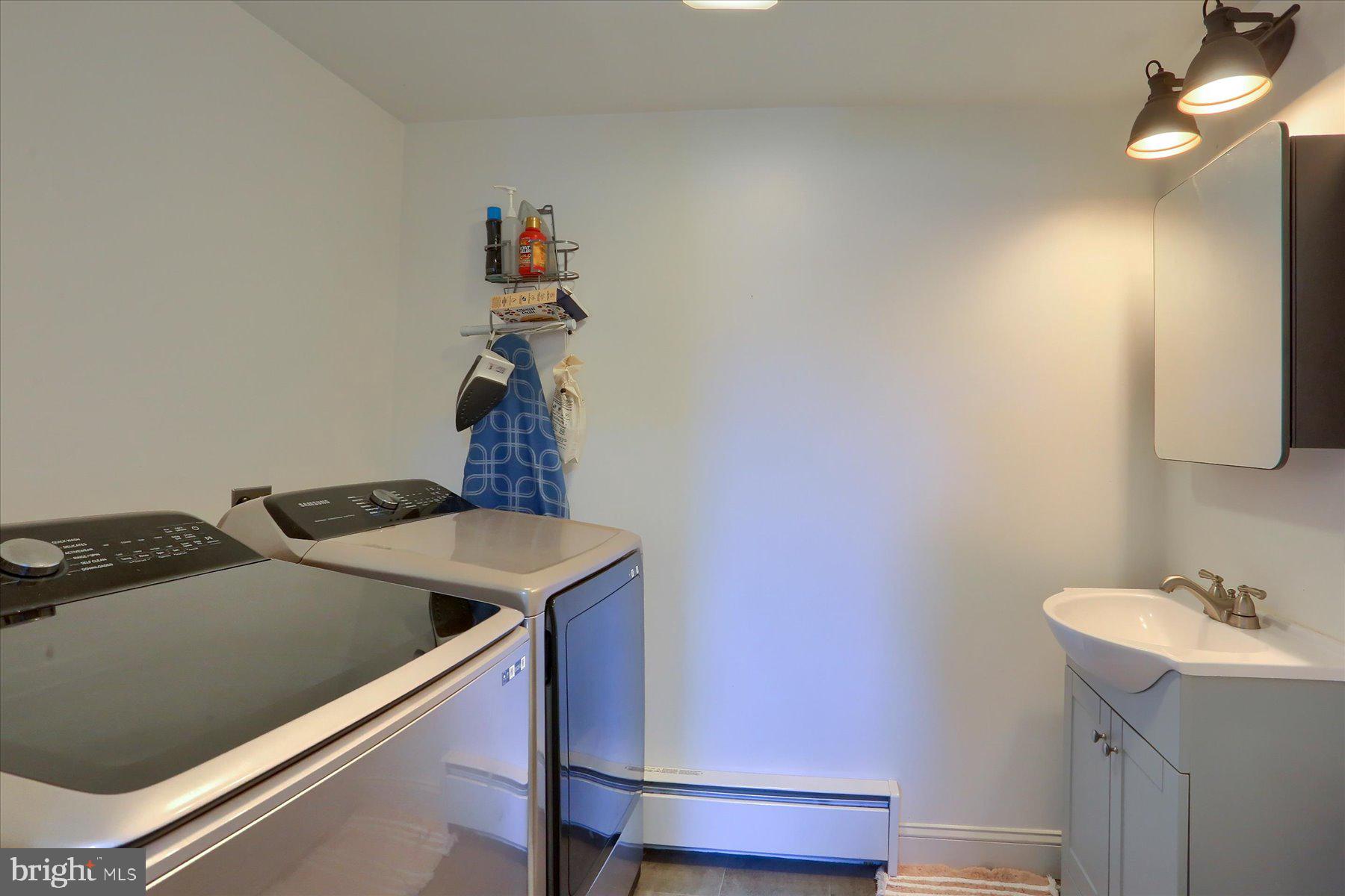 206 Armstrong Street Halifax, PA 17032 - Photo 10 of 20 a kitchen with a sink and a stove