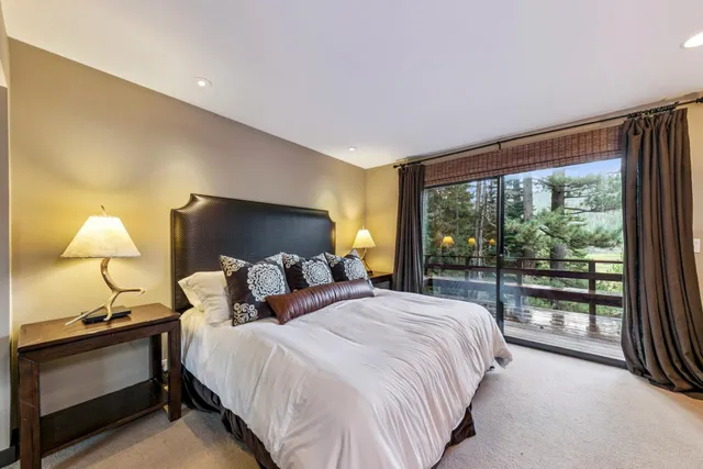 a bathroom with a double vanity sink and mirror