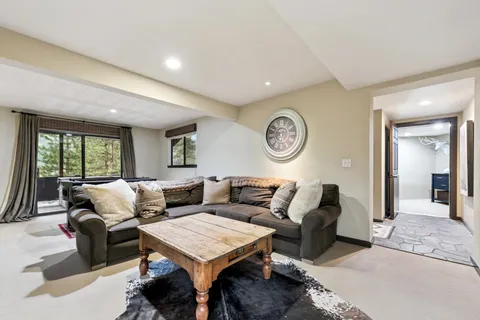 a view of a bathroom from a hallway