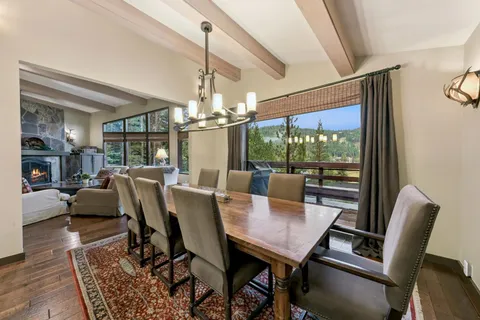 a kitchen with granite countertop appliances cabinets and a sink