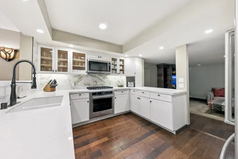 a view of a living room and dining room