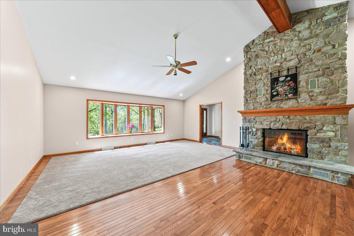 322 Buttonwood Road Landenberg, PA 19350 - Photo 11 of 60 Spacious living room with stone fireplace.
