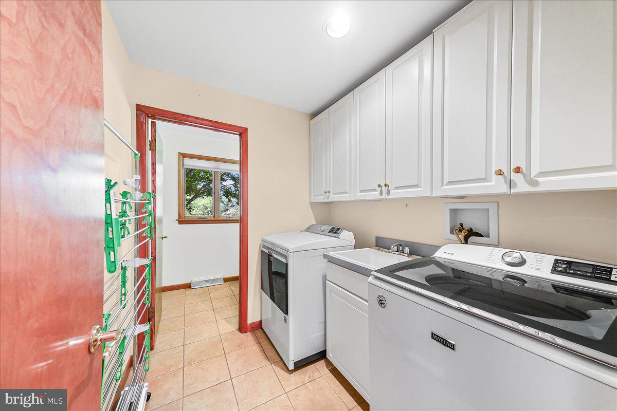 322 Buttonwood Road Landenberg, PA 19350 - Photo 31 of 60 Bright and functional laundry space.