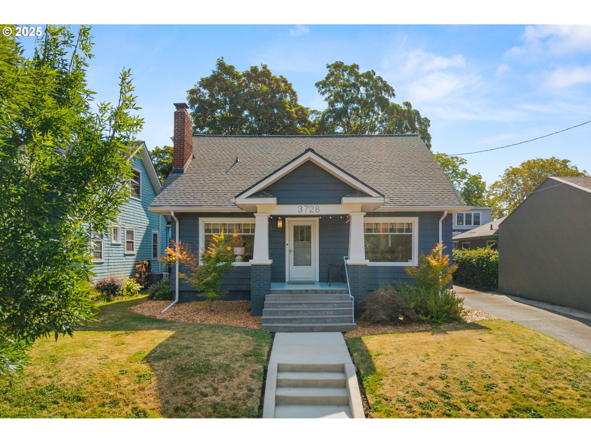 3728 Northeast 17th Avenue Portland, OR 97212 - Photo 2 of 6 a front view of a house with garden