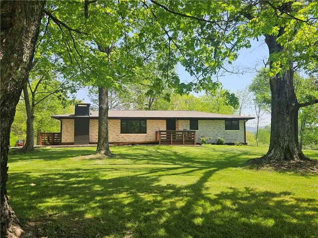 a house view with a outdoor space