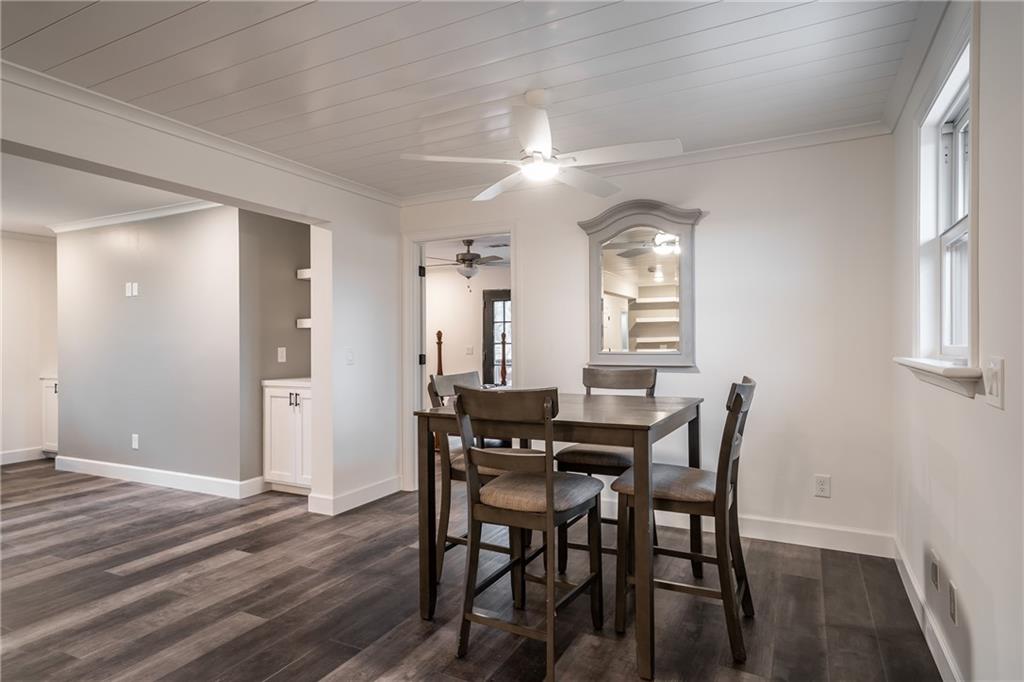 9351 Henderson Mountain Road Fairmount, GA 30139 - Photo 25 of 60 a view of a dining room with furniture and window