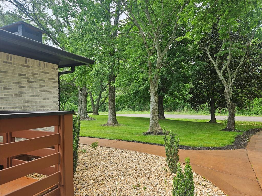 9351 Henderson Mountain Road Fairmount, GA 30139 - Photo 50 of 60 a view of a backyard with a garden