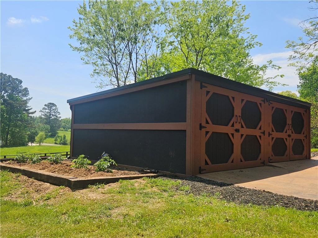 9351 Henderson Mountain Road Fairmount, GA 30139 - Photo 53 of 60 a front view of a house