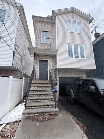 a front view of a house with a balcony