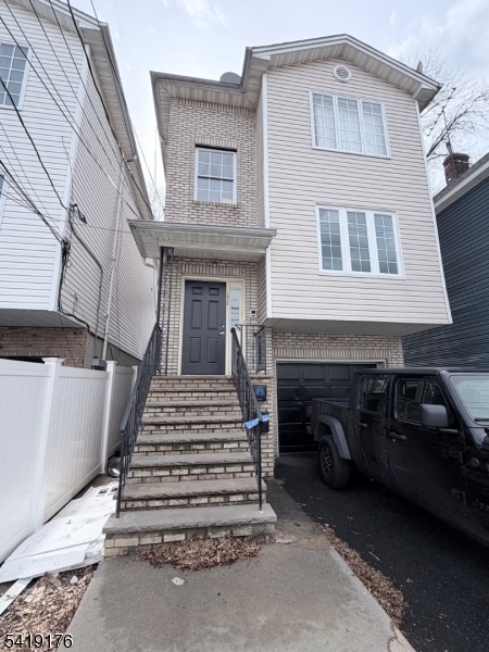 a front view of a house with a balcony