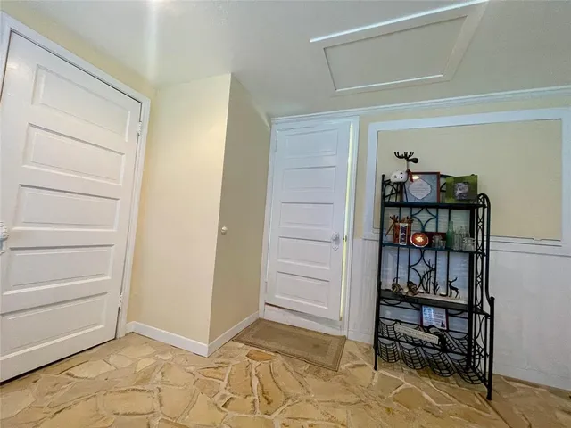 a view of a swimming pool and a yard