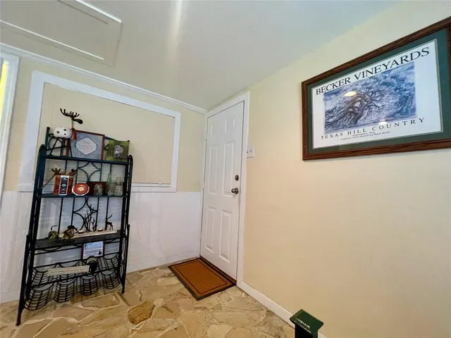 a view of swimming pool with a yard and sitting area