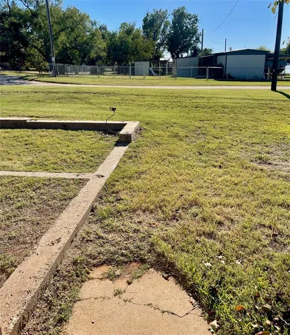a view of swimming pool with trees