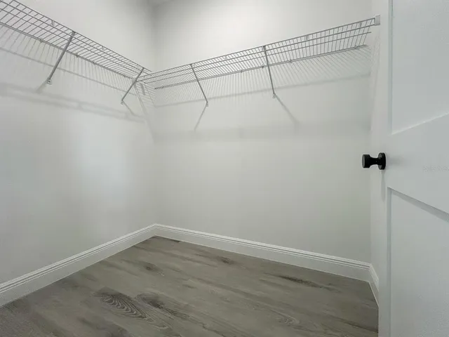 a view of a room with racks on the wall