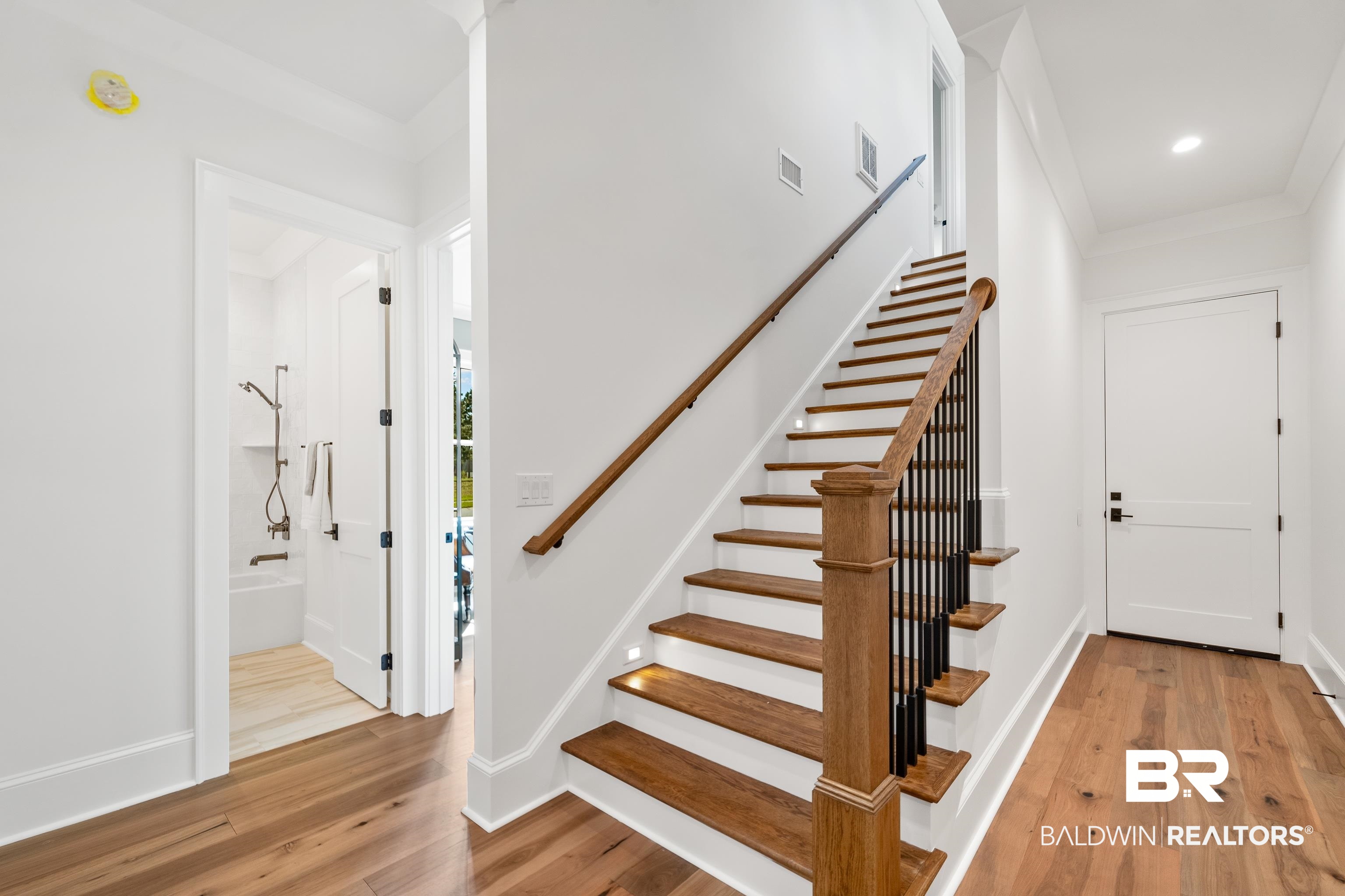 601 Teton Rdg Road Fairhope, AL 36532 - Photo 29 of 59 Wood Tread Staircase to Bedrooms 4 & 5 & Bonus