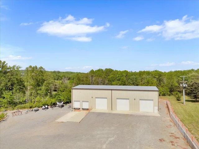 a view of a road with a building in the background