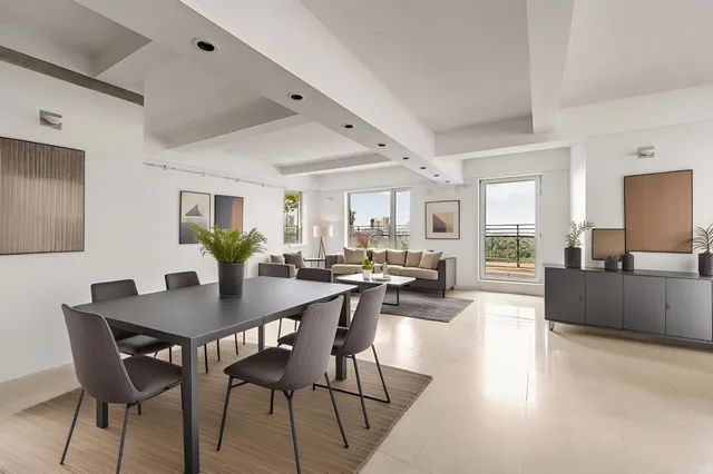 a view of swimming pool with outdoor seating