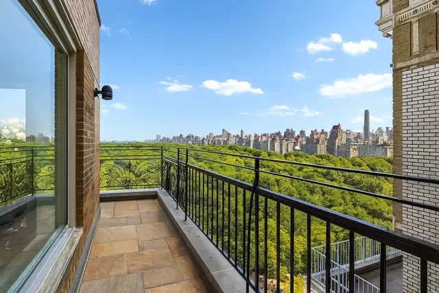 a view of a lake from a balcony