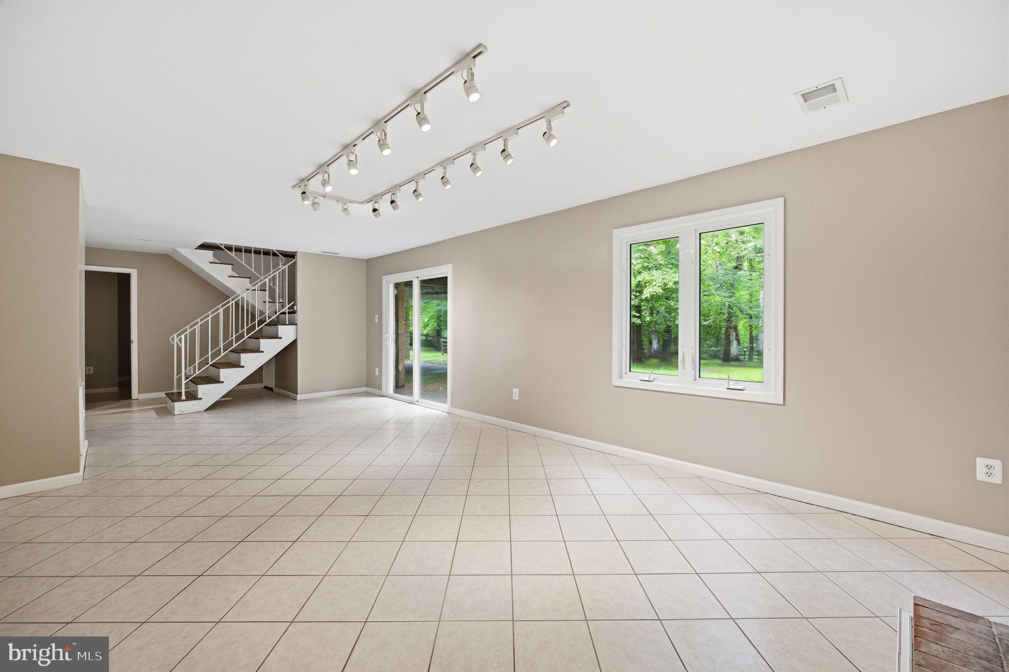 2506 Pinoak Lane Reston, VA 20191 - Photo 23 of 33 a view of an empty room with windows