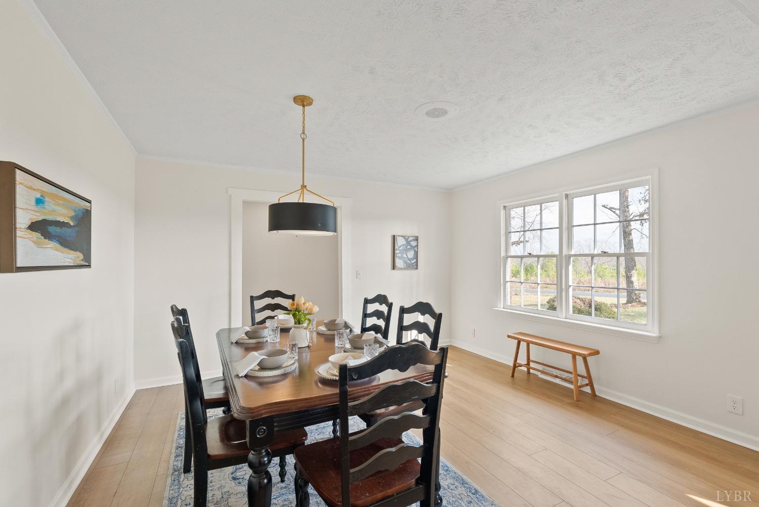 9108 Wheelers Spring Road Appomattox, VA 24522 - Photo 6 of 50 a view of a dining room with furniture window and outside view