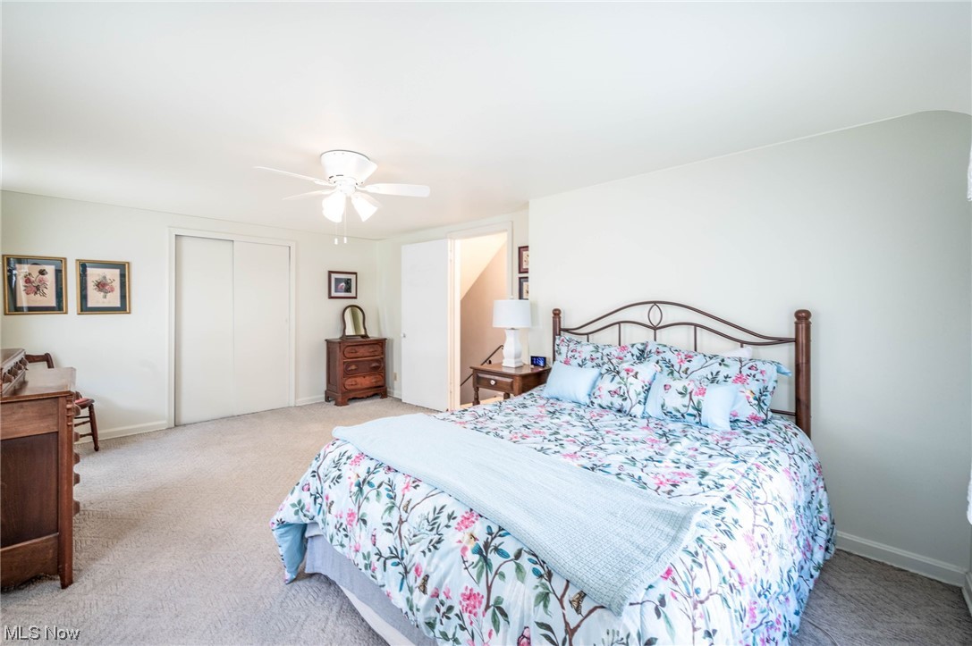 253 Butler Road Northeast Warren, OH 44483 - Photo 22 of 35 Bedroom featuring a closet, and ceiling fan
