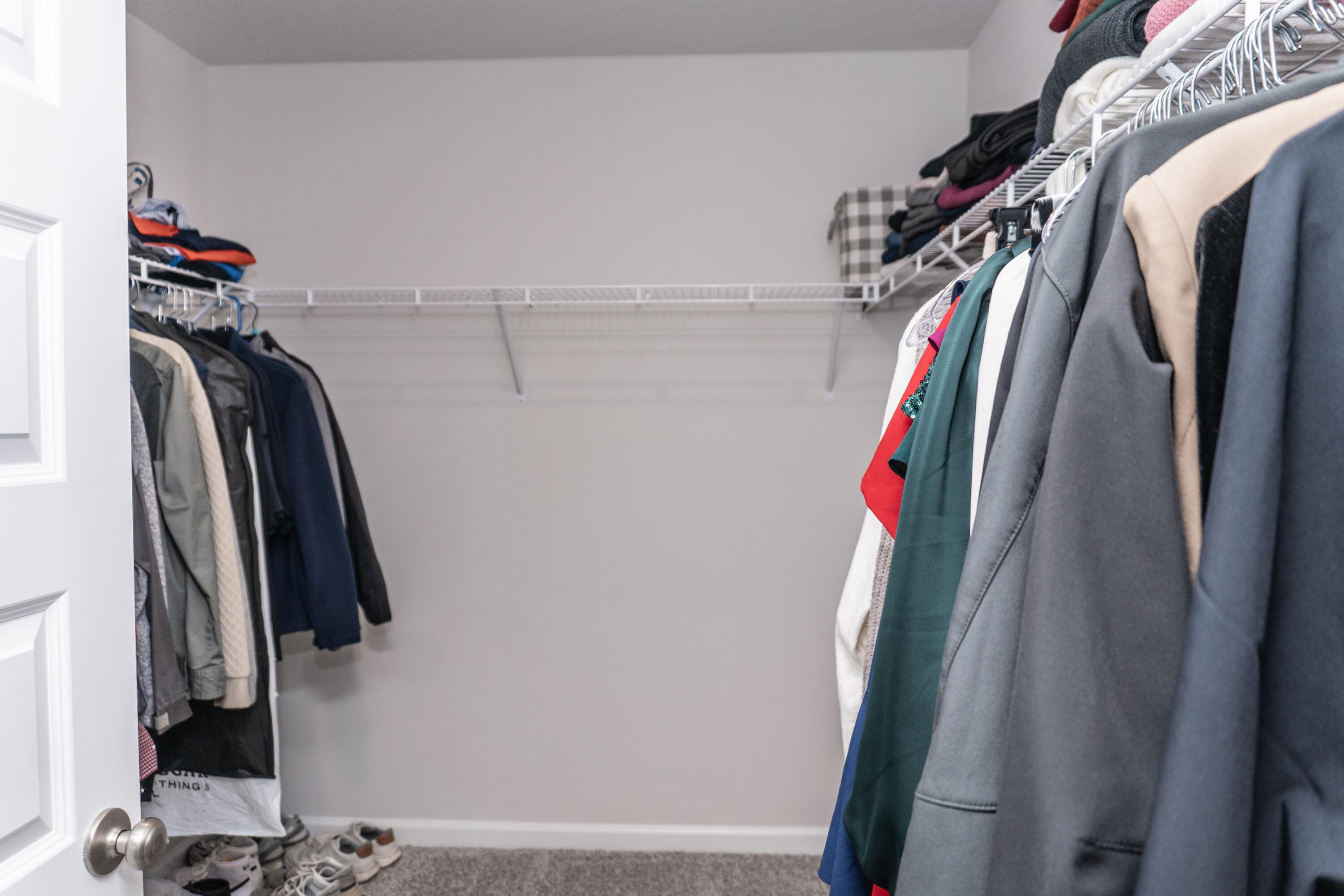 3431 Phoenix Court Crestview, FL 32539 - Photo 18 of 29 a view of walk in closet with clothes and shoes